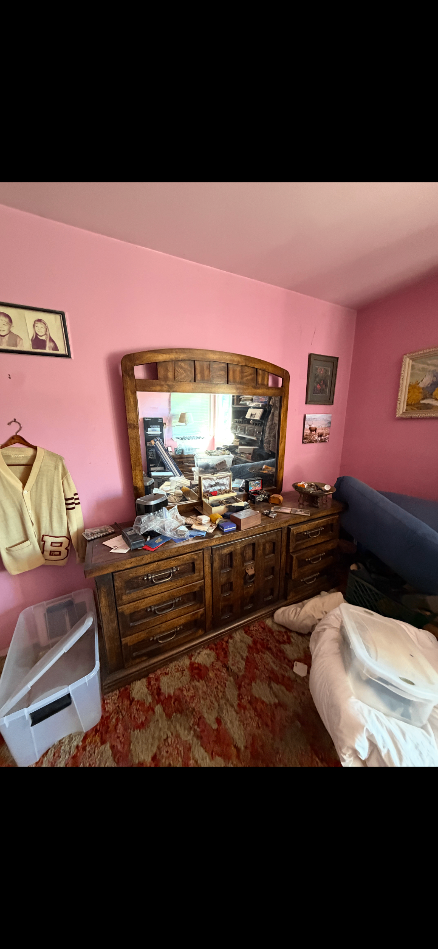 Bedroom full of old furniture and belongings before a Greer Hauling cleanout