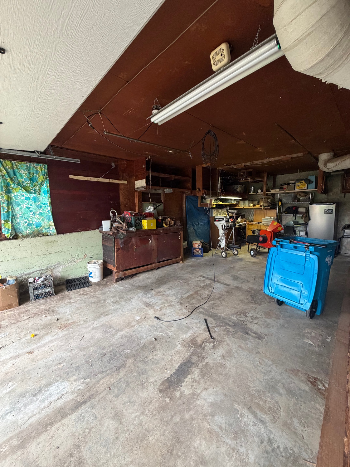 The same garage cleared out and swept after a Greer Hauling garage cleanout
