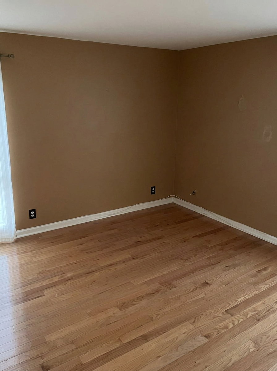 The same guest bedroom completely empty after Greer Hauling removed the furniture